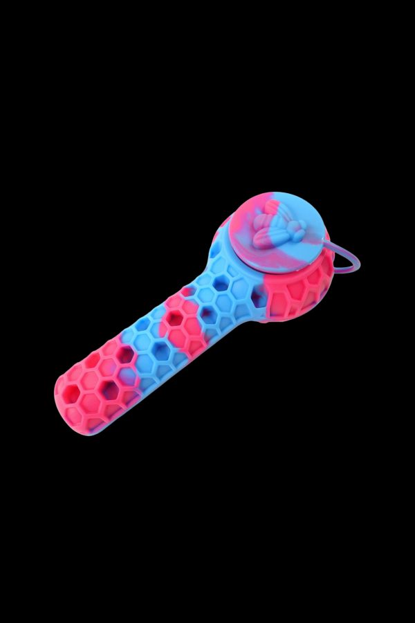 Colorful silicone smoking pipe with a honeycomb texture.