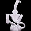 Clear glass dab rig with intricate bubbler design, isolated on a black background.
