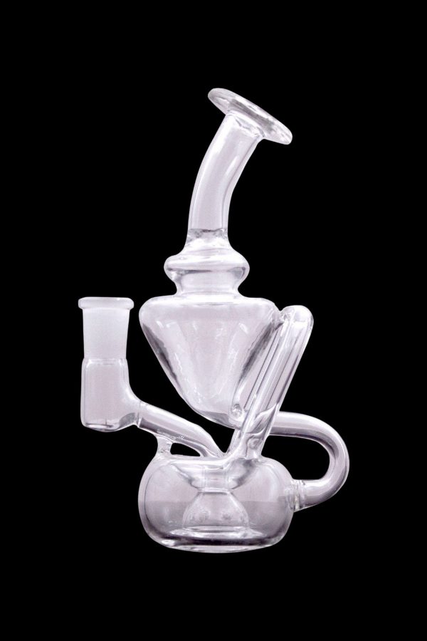 Clear glass dab rig with intricate bubbler design, isolated on a black background.