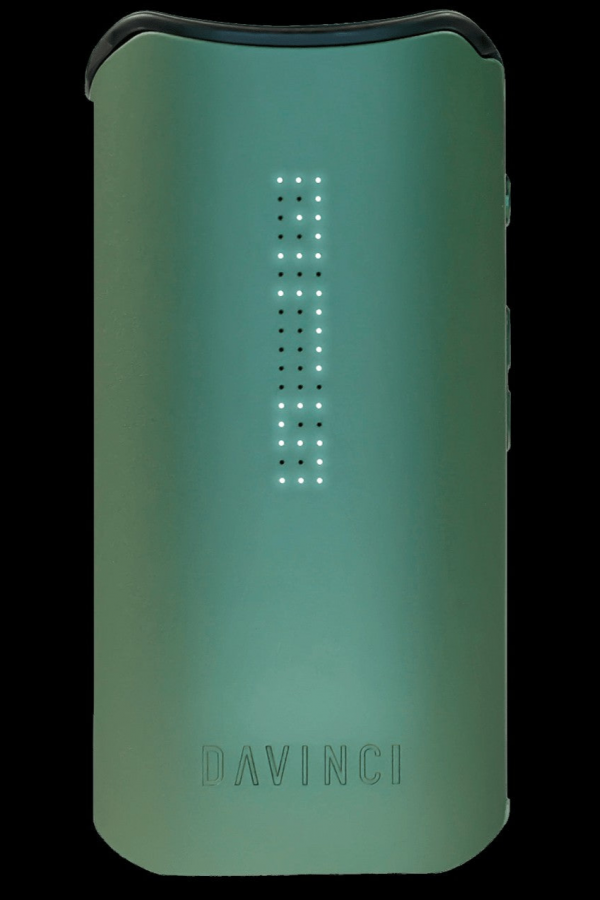 Teal DaVinci IQ2 cannabis vaporizer with illuminated indicator lights.