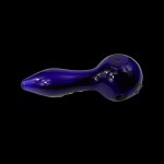 Purple glass smoking pipe isolated on a black background.
