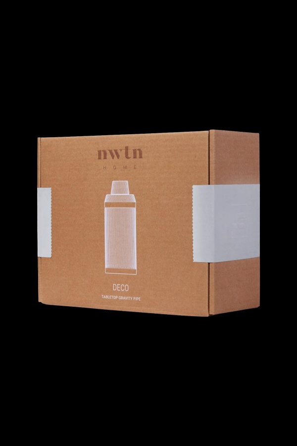 Brown cardboard box for a “nwtn Home Deco Tabletop Gravity Pipe” with a minimalist illustration of the pipe on the front.