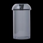 Clear glass bubbler water pipe isolated on a black background.