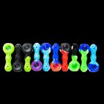 Assorted glass cannabis pipes in vibrant colors, arranged in a row against a black background.