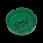 Green glass ashtray with “Alien Labs” logo.