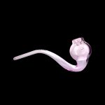 Pink glass bubbler pipe against a black background.