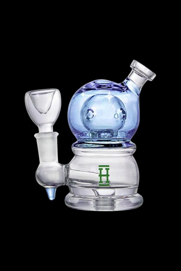 Blue glass rig with a green logo, used for vaporizing concentrates.