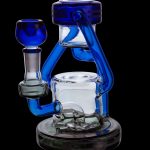 Blue glass water pipe (rig) with intricate curves and a clear glass bowl.