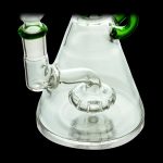 Clear glass water pipe (bong) with a complex percolator and green accents, isolated on a black background.