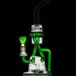 Green and white glass dab rig against a black background.