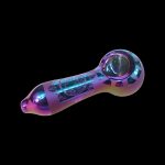 Iridescent glass pipe with etched designs against a black background.