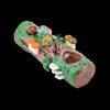 Hand-blown glass pipe sculpted as a whimsical forest log with colorful mushrooms, flowers, and a smiling face.