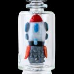 Hand-blown glass water pipe shaped like a colorful rocket ship.