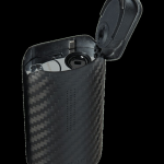 Black textured cannabis vaporizer with open lid.