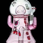 Glass water pipe shaped like a cartoon monster with a wide-open mouth and googly eyes.