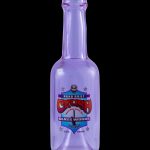 Purple glass bottle with "Crash Glass Works" label, likely for cannabis concentrates.