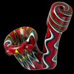 Hand-blown glass pipe with red, white, and green swirling patterns.
