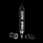 Black cannabis dab pen with “HUMAN SUCKS” text vertically along the side, disassembled with caps nearby on a black background.