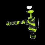Green and black glass water pipe (rig) with accompanying accessories on a black background.