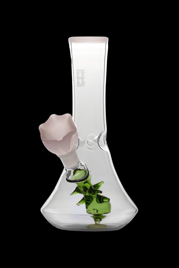 Glass bong with cannabis leaf inside.