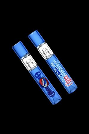 Two blue cannabis oil vape cartridges with branded labels against a black background.