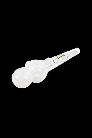 White glass cannabis oil burner pipe isolated on a black background.
