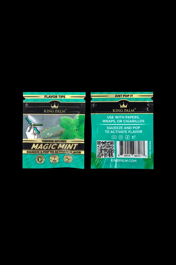 Two packets of King Palm Magic Mint terpene-infused flavor tips for use with papers, wraps, or cigarillos, featuring green and black packaging with instructions to “squeeze & pop” to activate flavor.