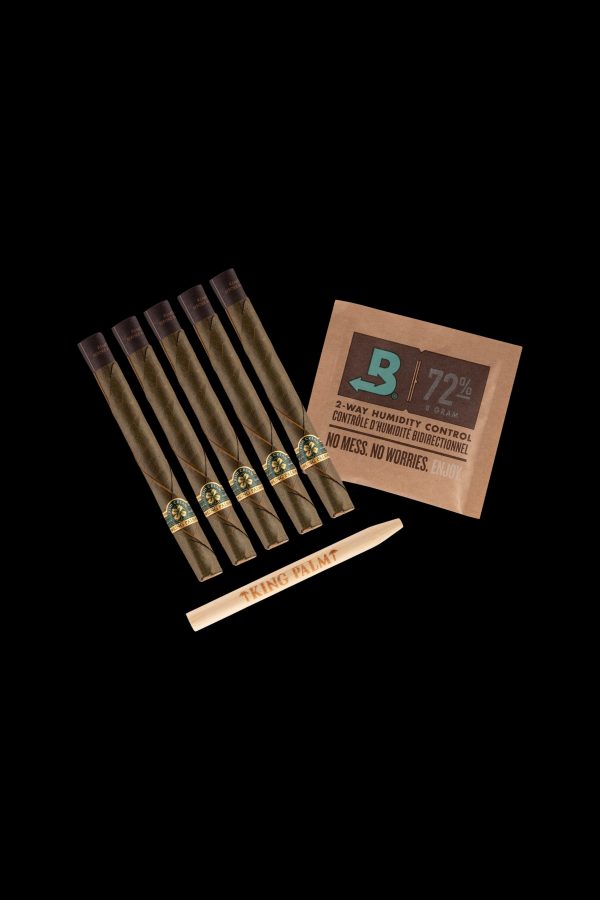 Cannabis pre-rolls with a Boveda humidity control pack on a dark background.