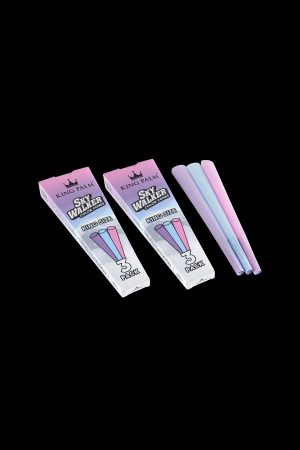 Two packs of King Palm Sky Walker pre-rolled cones in shades of pink and blue against a black background.