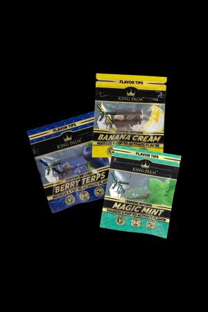 Assortment of King Palm flavor tips in Berry Terps, Banana Cream, and Magic Mint, displayed against a dark background.