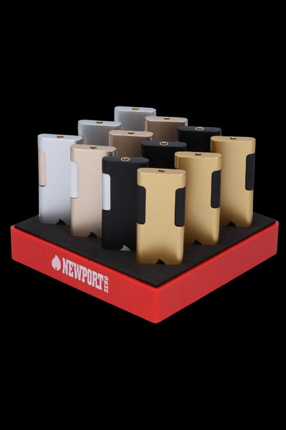 Assortment of gold and silver butane lighters displayed on a red Newport Zero branded tray, likely for cannabis use.