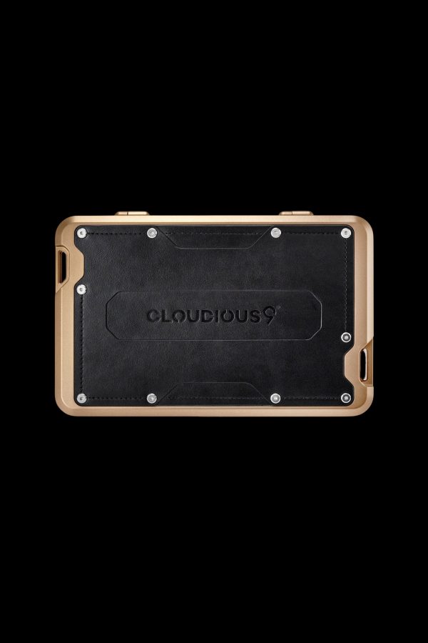 Gold-framed cannabis vaporizer device with “Cloudious9” branding.