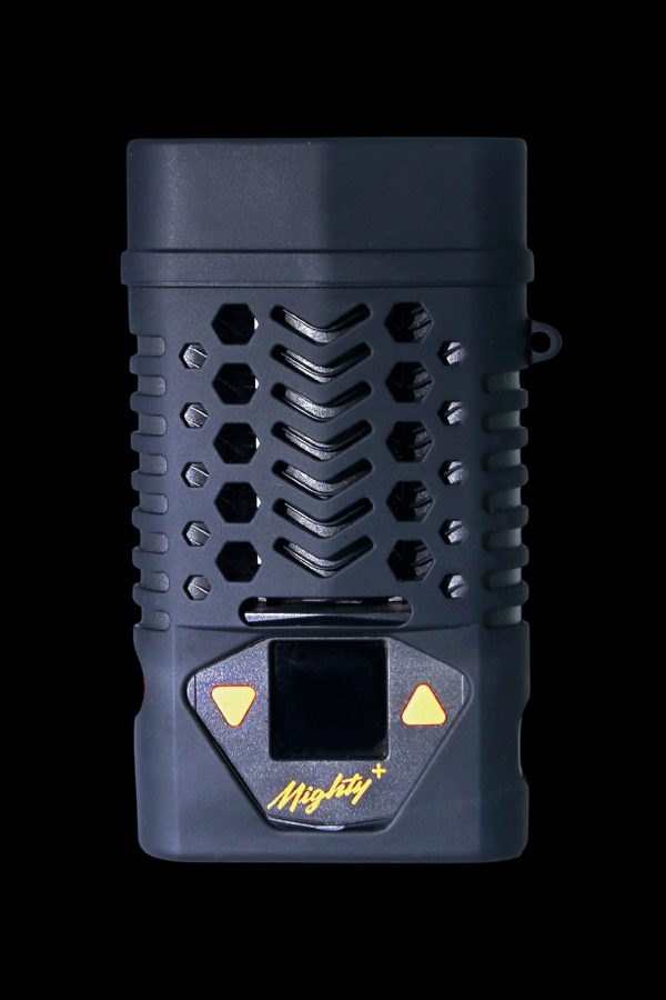 Black Storz & Bickel Mighty+ vaporizer with gold accents and a digital display.