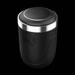 Sleek black cannabis grinder with a push-button opening mechanism.