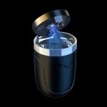 Sleek, black cannabis odor neutralizer with glowing blue air purification system.