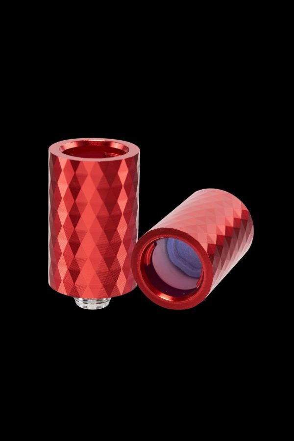 Red cannabis dab rig attachment with geometric pattern.