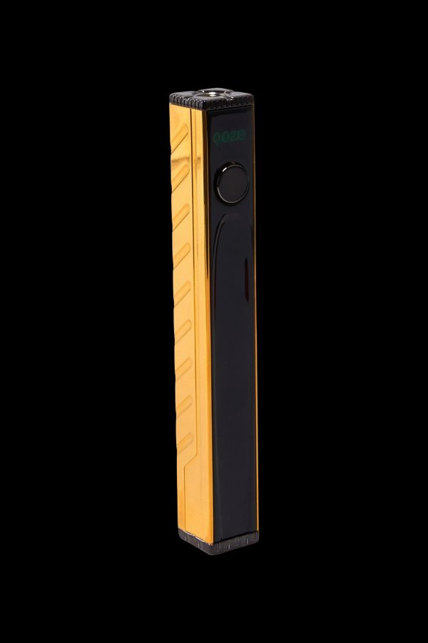 Gold and black electronic vaporizer pen with digital display.