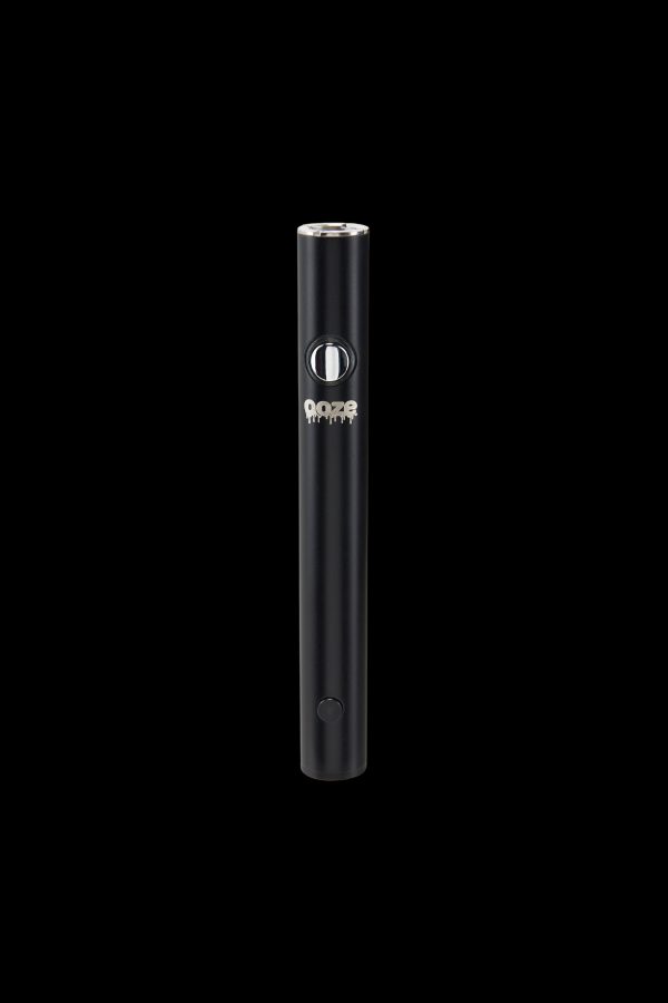 Black cannabis vape pen with “ooze” branding against a black background.