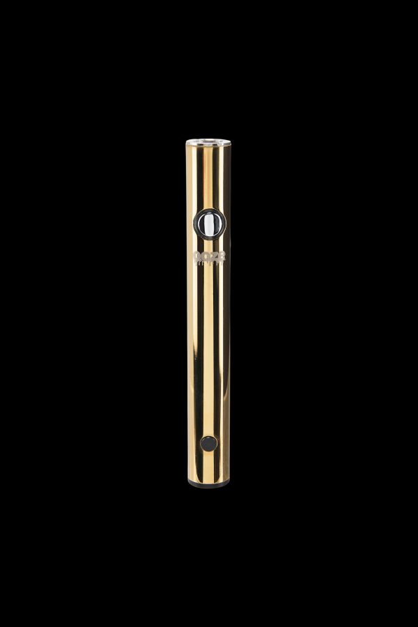 Gold cannabis vape pen on a black background.