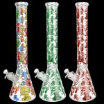 Three glass bongs with colorful mushroom designs against a black background.