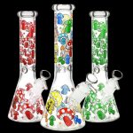 Three glass bongs decorated with colorful mushroom designs against a black background.