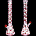 Two pink glass bongs decorated with a red cherry pattern against a black background.