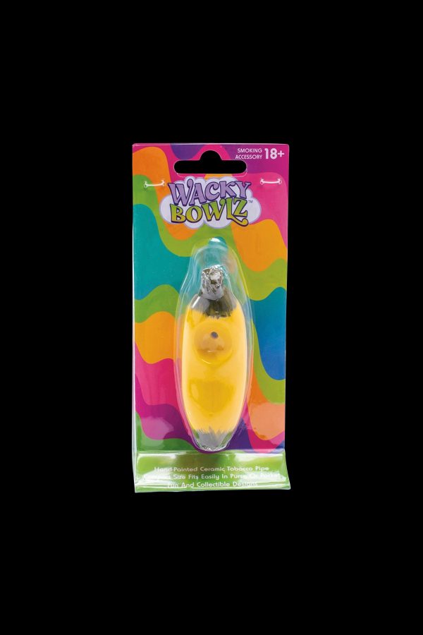 A brightly colored, hand-painted ceramic pipe marketed as a “Wacky Bowlz” smoking accessory, displayed on a blister card with an 18+ age restriction.