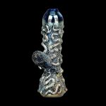 Hand-blown glass bubbler with swirling blue and silver patterns, against a black background.