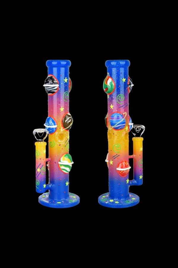 Two colorful glass bongs with a planetary and star-themed design against a black background.