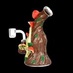 Hand-blown glass rig shaped like a tree with colorful mushrooms, featuring a quartz banger for cannabis concentrates.