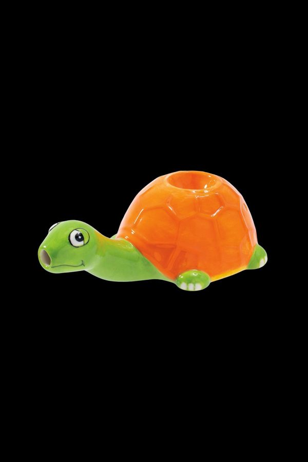 Orange and green glass turtle-shaped smoking piece.
