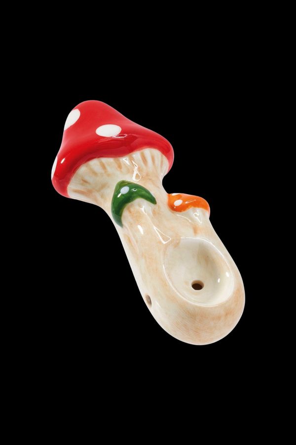 Ceramic mushroom-shaped smoking pipe with a white, beige, and red glaze.