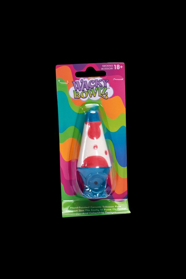 A packaged, hand-painted ceramic pipe resembling a lava lamp, labeled “Wacky Bowlz” with an 18+ age restriction.