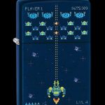A Zippo lighter displaying a pixelated Space Invaders game scene with a spaceship shooting at alien invaders.